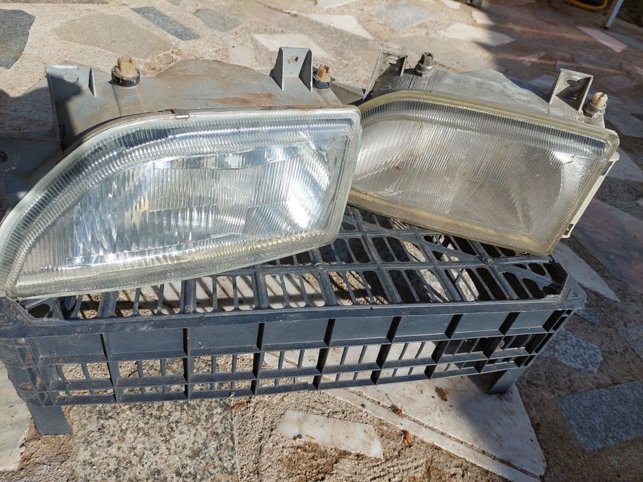 2 Óticas frontais Ford Escort