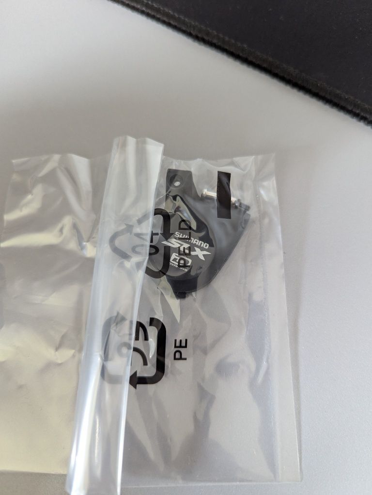 Shimano SL M670 SLX Manetka dźwignia przerzutki 10 rz. prawa / obejma