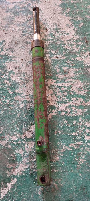 Гідроциліндр підйому жатки John Deere 1075, 1085, 1065