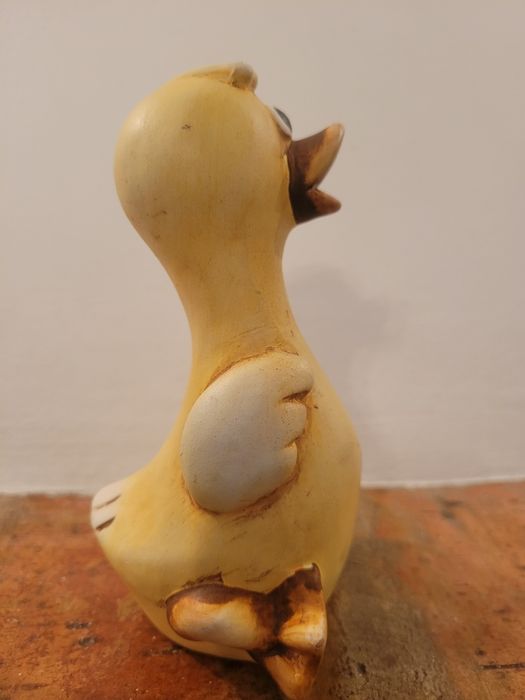Pato amarelo cerâmico