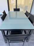 Mesa de exterior com 6 cadeiras