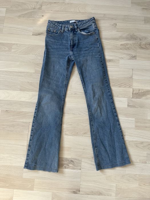 spodnie jeansy dzwony z niskim stanem low waist wide leg