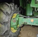 Napęd na tył 4x4 kombajnu sieczkarni John Deere hydromotory oś napędow
