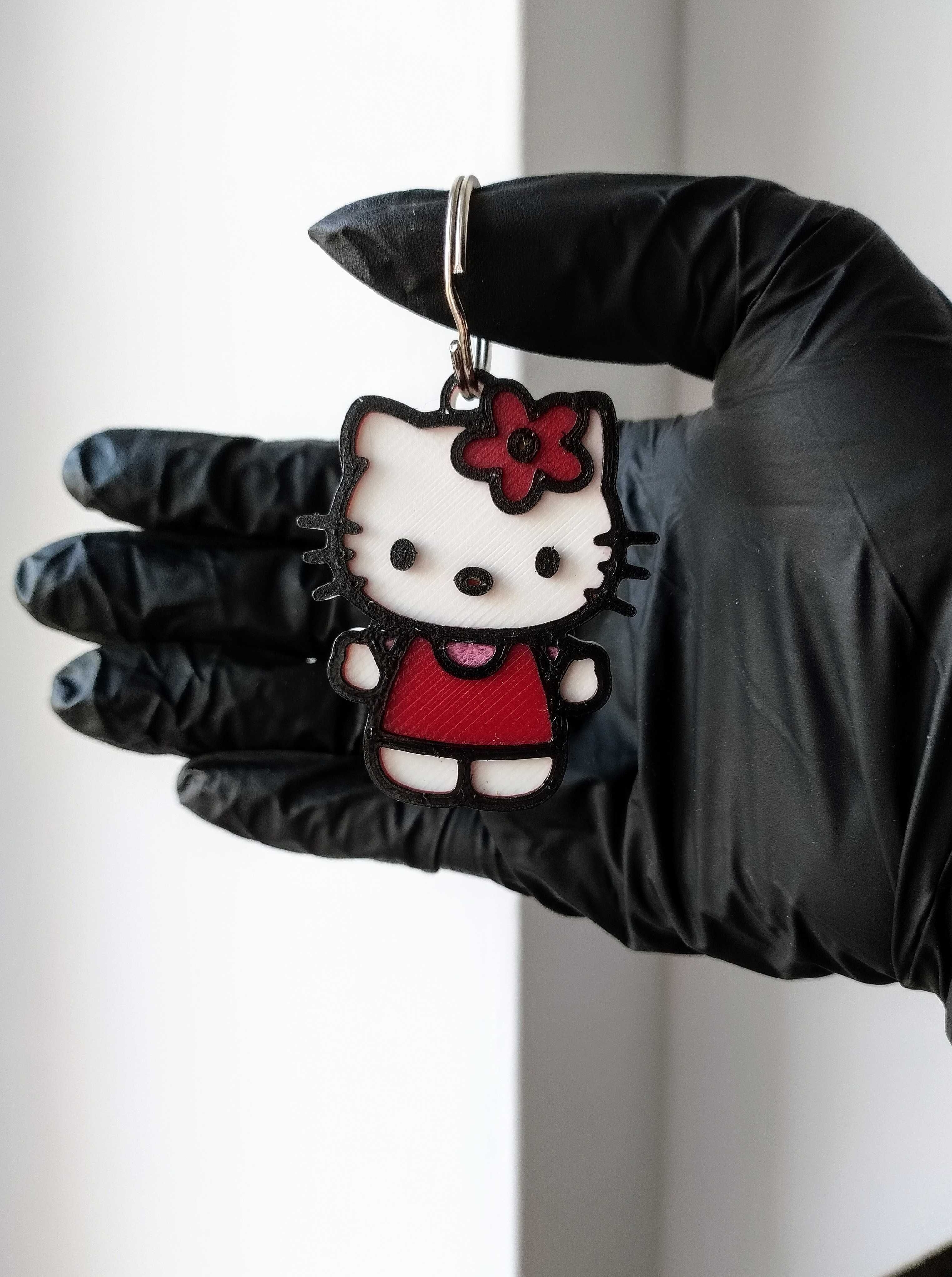 Zawieszka Breloczek Hello Kitty kwiatek czerwony