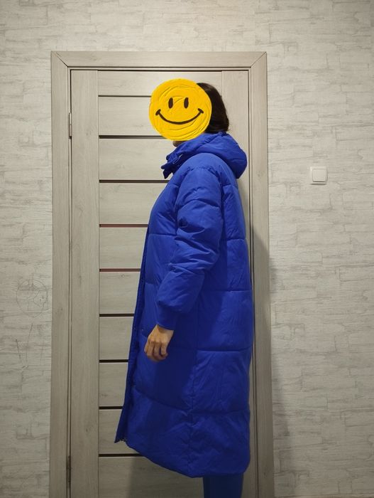 Довгий  пуховик.