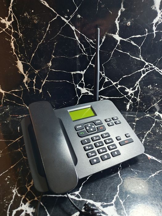 Стационарный GSM телефон