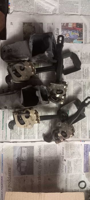 Ograniczniki drzwi OE BMW 530i-kpl.- stan bdb.