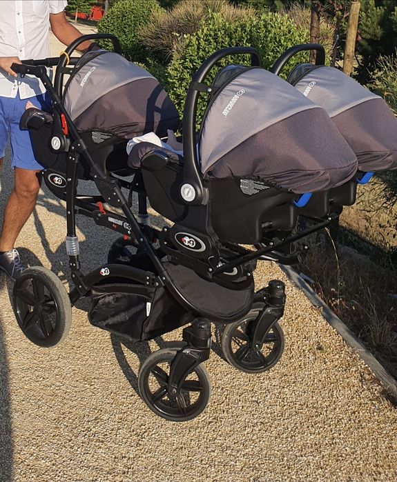 Carrinho de bebé trigemios