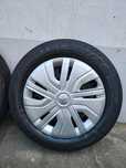 Bridgestone Ecopia 165/65R14 z felgami i kołpakami 2022r. (4 sztuki)