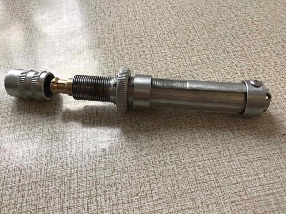 Спиненговый держатель катушки