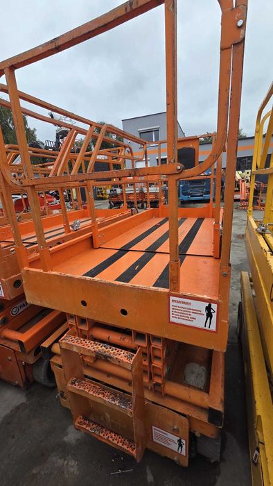 Podnośnik nożycowy Haulotte Compact10 elektryczny 10m JLG Genie 2646