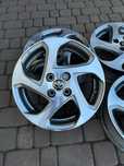 Oryginalne alufelgi Toyota 4x100 15 cali CZUJNIKI Yaris Aygo Bicolor