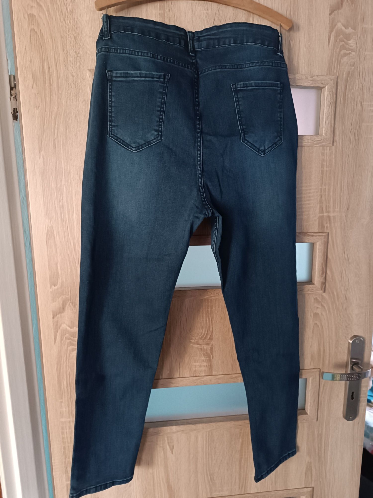 Spodnie damskie jeansowe serce cyrkonie r.56