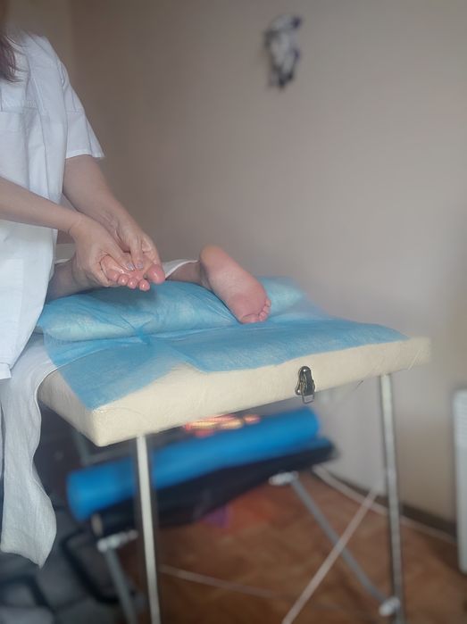 Масаж тейпування