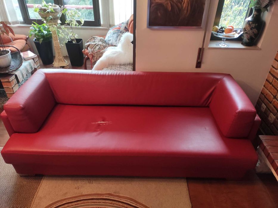 Sofá usado com pequeno defeito
