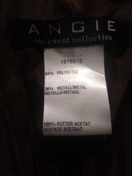 Костюм шоколадного кольору. Розмір  L,