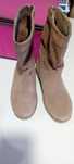 Botins praticamente novos