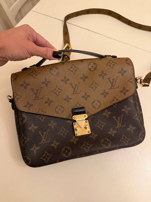 Сумка шкіряна в лого в ідеальному стані