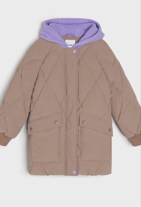 Подовжена стьобана куртка