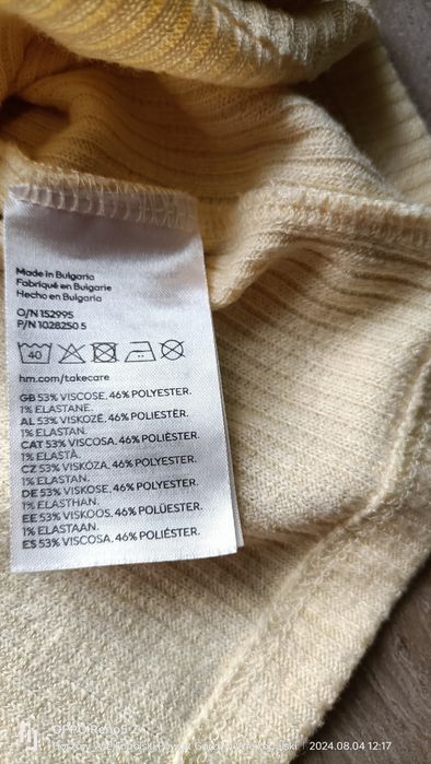 Jasnożółty krótki sweterek/bolerko. H & M