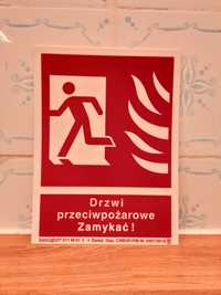 Znak Drzwi przeciwpożarowe. Zamykać! (w lewo)