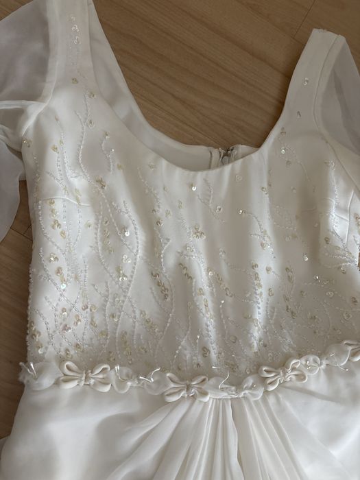 Kremowa sukienka ślubna