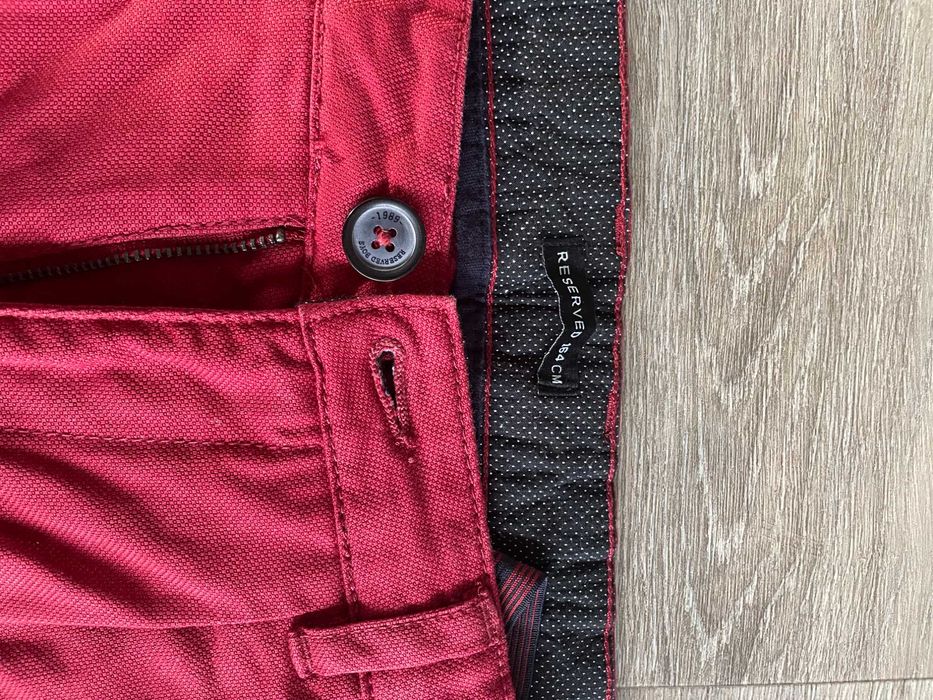 Długie spodnie Reserved 164