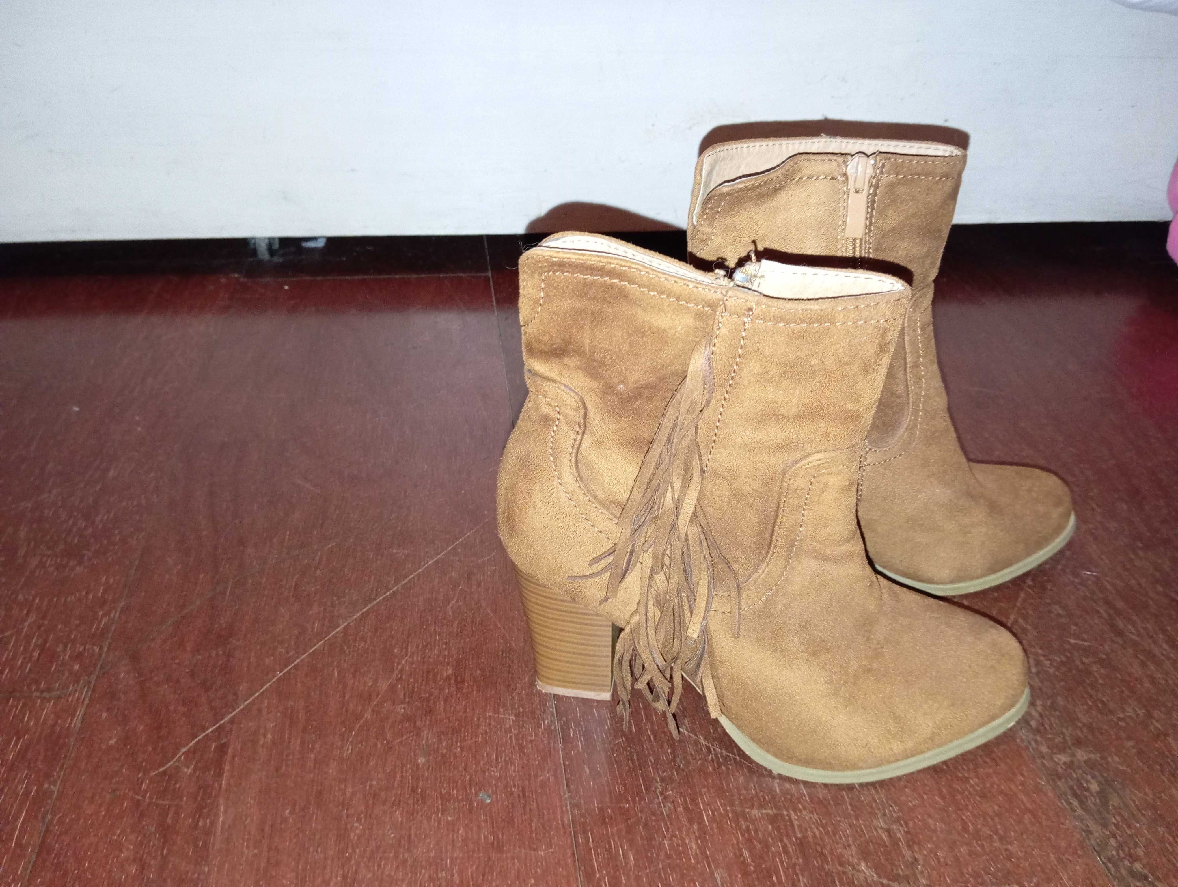 Botas  salto alto mulher