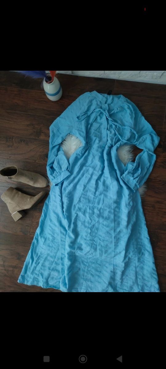 Maxi Baby blue sukienka Pastela Boho wiązanie
Rozmiar L