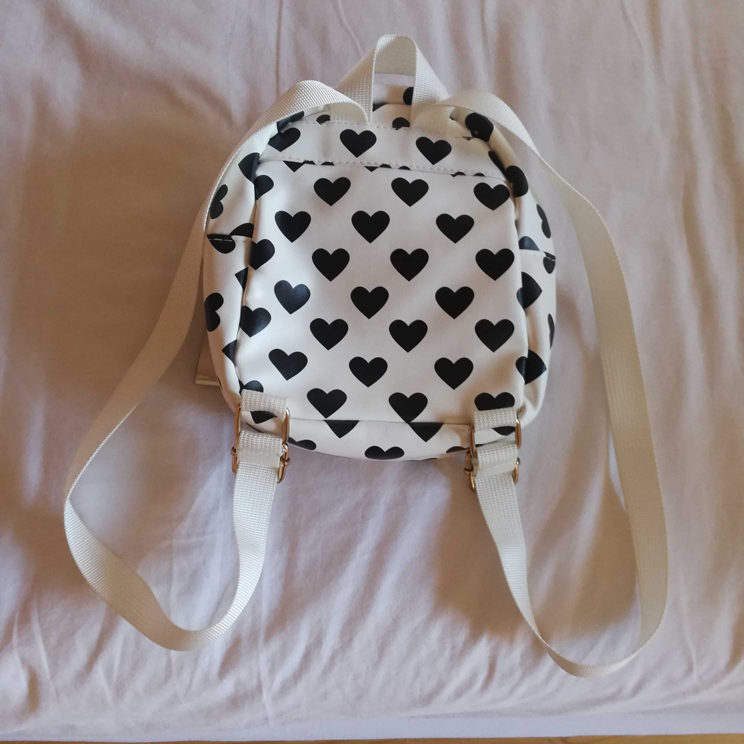 Mochila Claire's - Como Nova