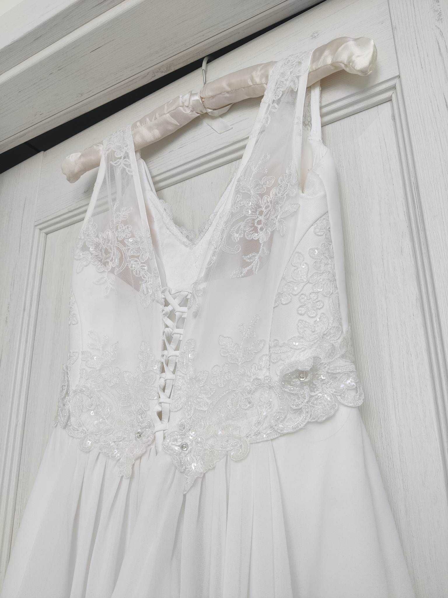 wyjątkowa suknia ślubna piękna biel