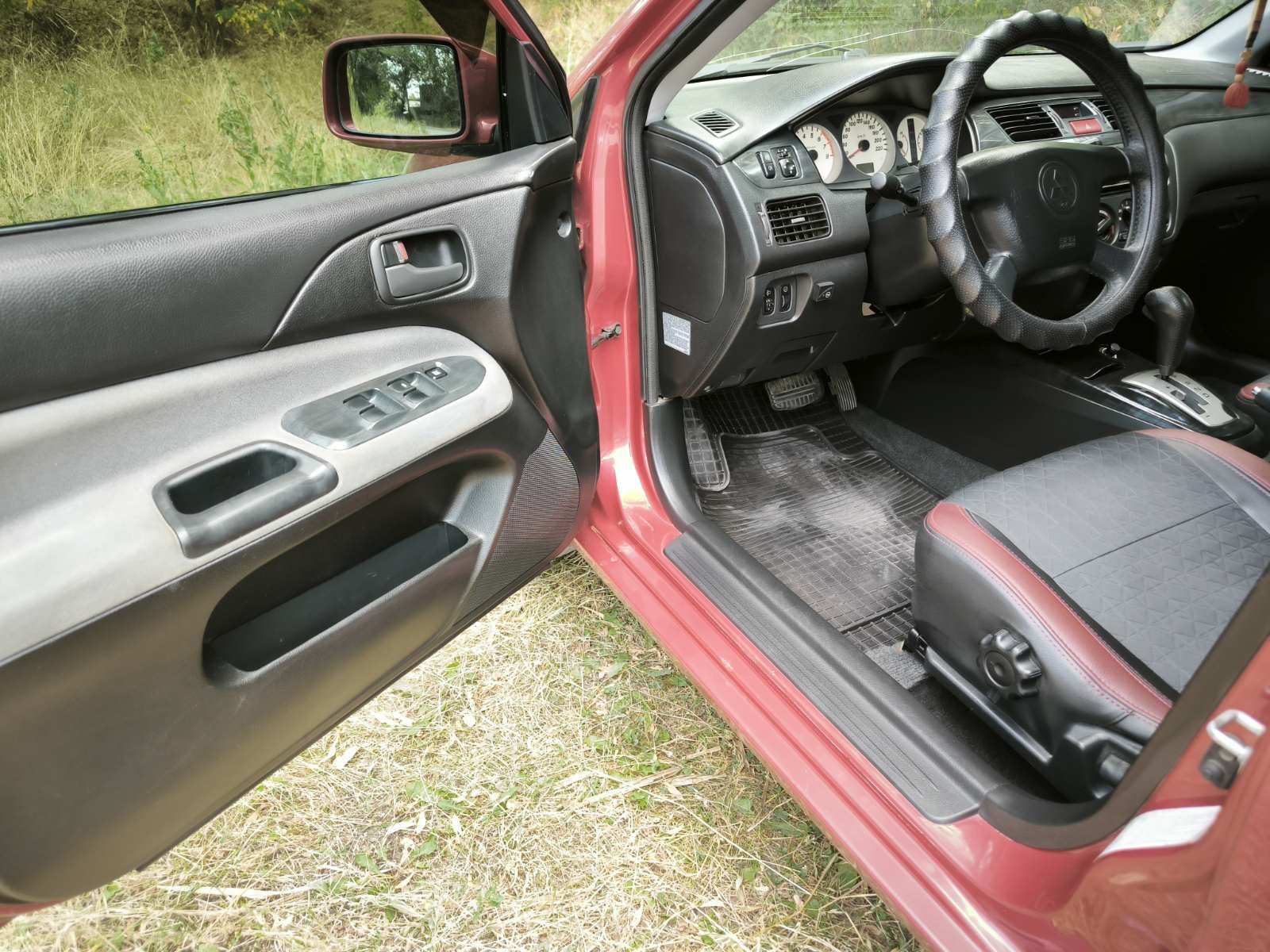 Mitsubishi Lancer 9 2004 (2005) 1.6, автомат