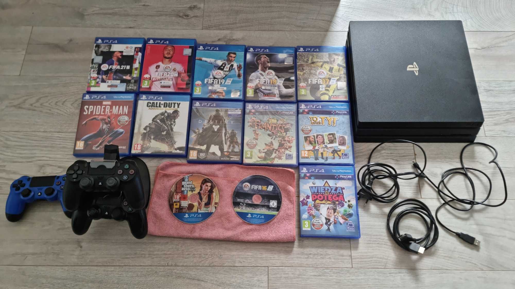 Ps4 Pro 1-TB + 3 pady + 13 gier + stacja ładujaca pady