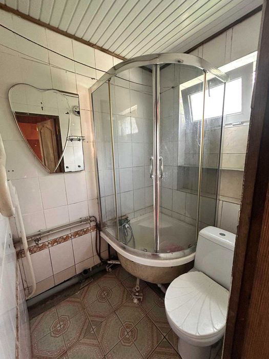 Половина будинку в центрі по вул. Старогончарній