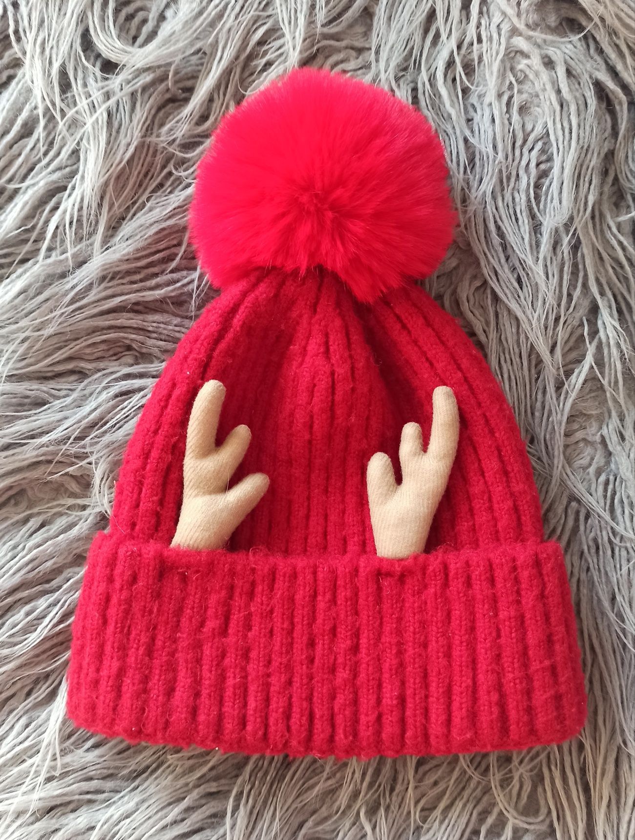Zimowa czapka z pomponem r. 56