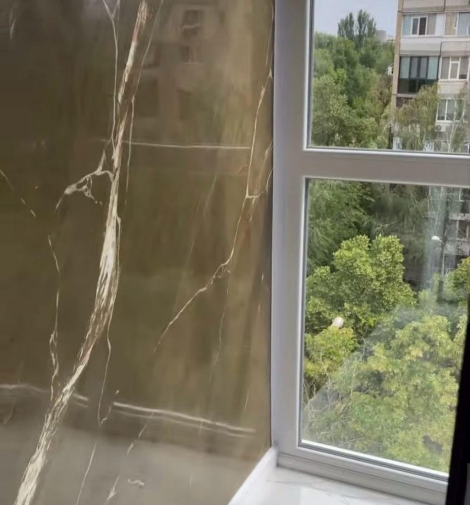 Свято міколаевська , біля річки біля входу у парк