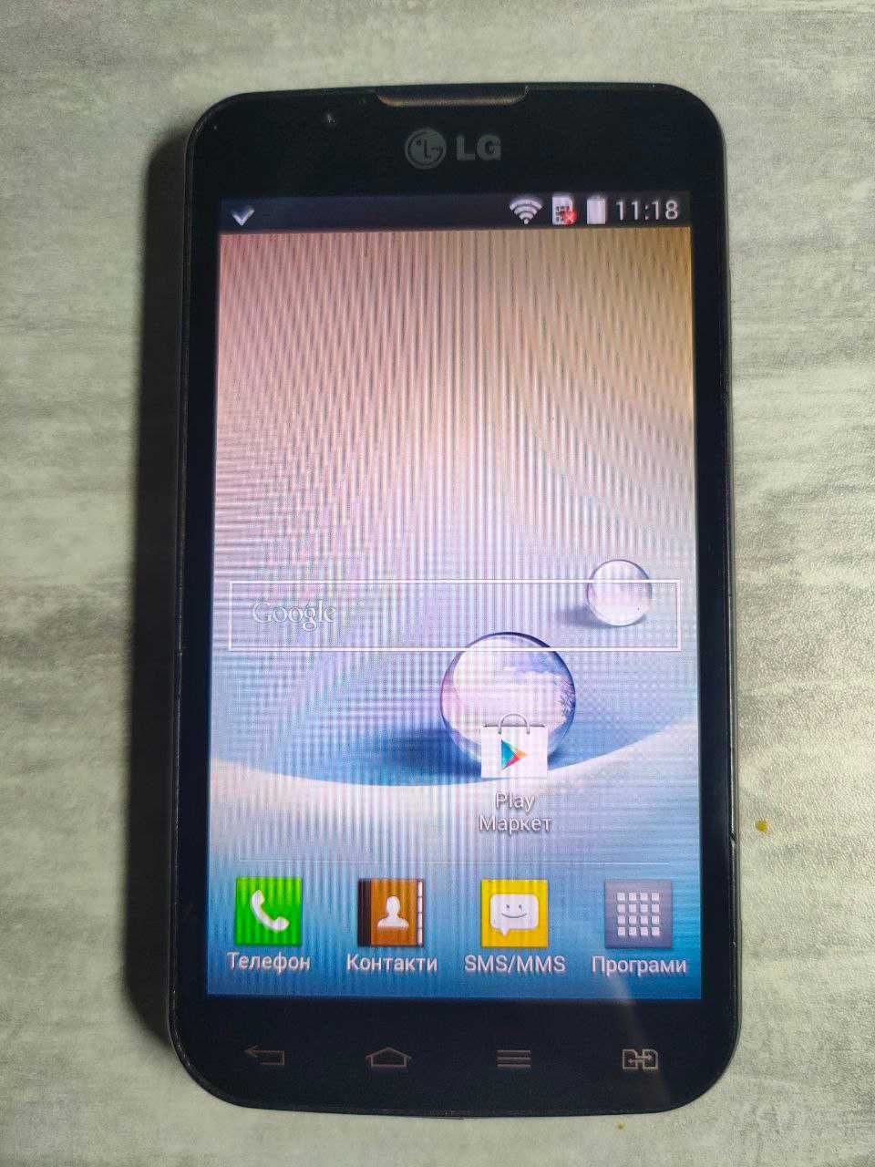 Смартфон LG P-715