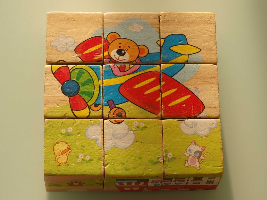 Drewniana układanka kostki a'la puzzle pojazdy 6 obrazków 9 kostek
