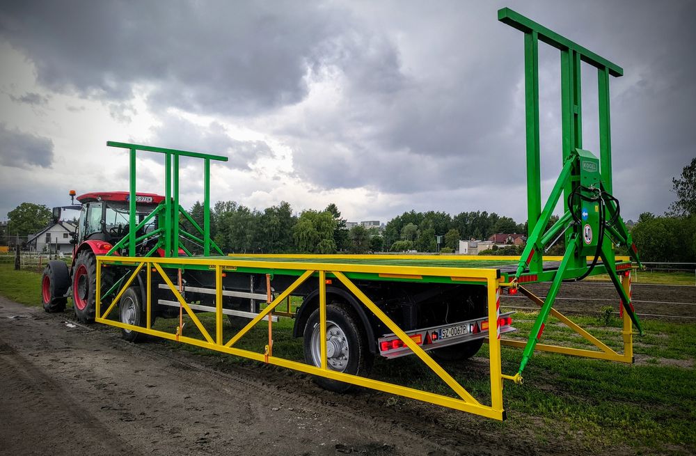 Przyczepa do bel z burtami hydraulicznymi