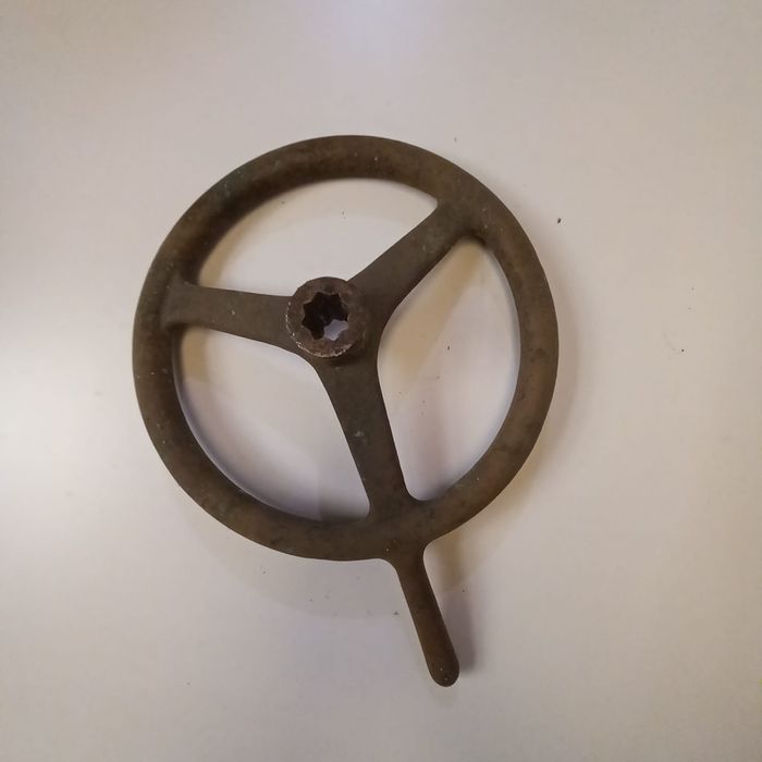 Volante de molinete em bronze