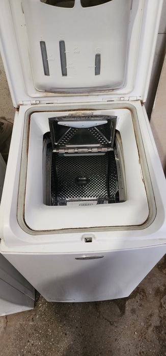 Whirlpool пральна машина з вертикальним завантаженням