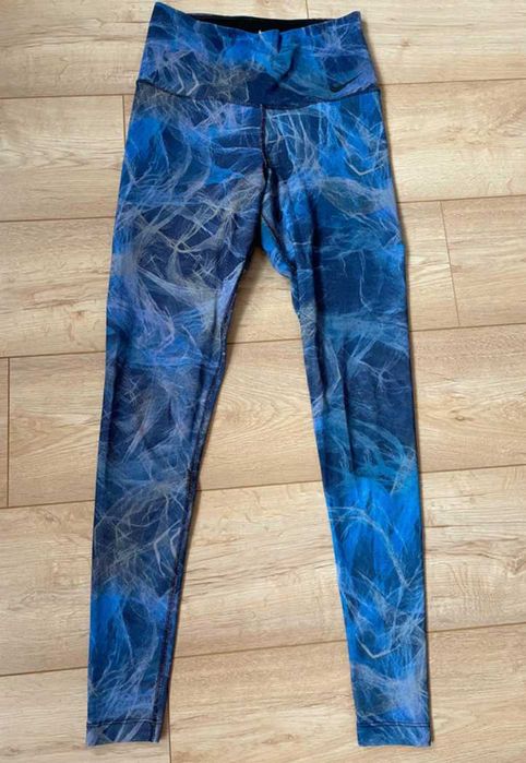 Legginsy Nike niebieskie siateczkowe z wbudowanymi spodenkami
