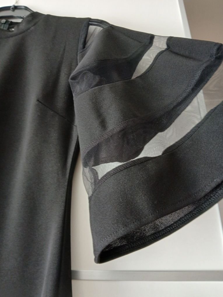 Vestido preto, justo e comprido