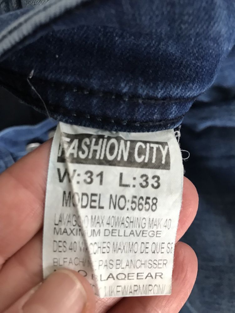 Spodnie meskie jeansowe na guziki W31 L33