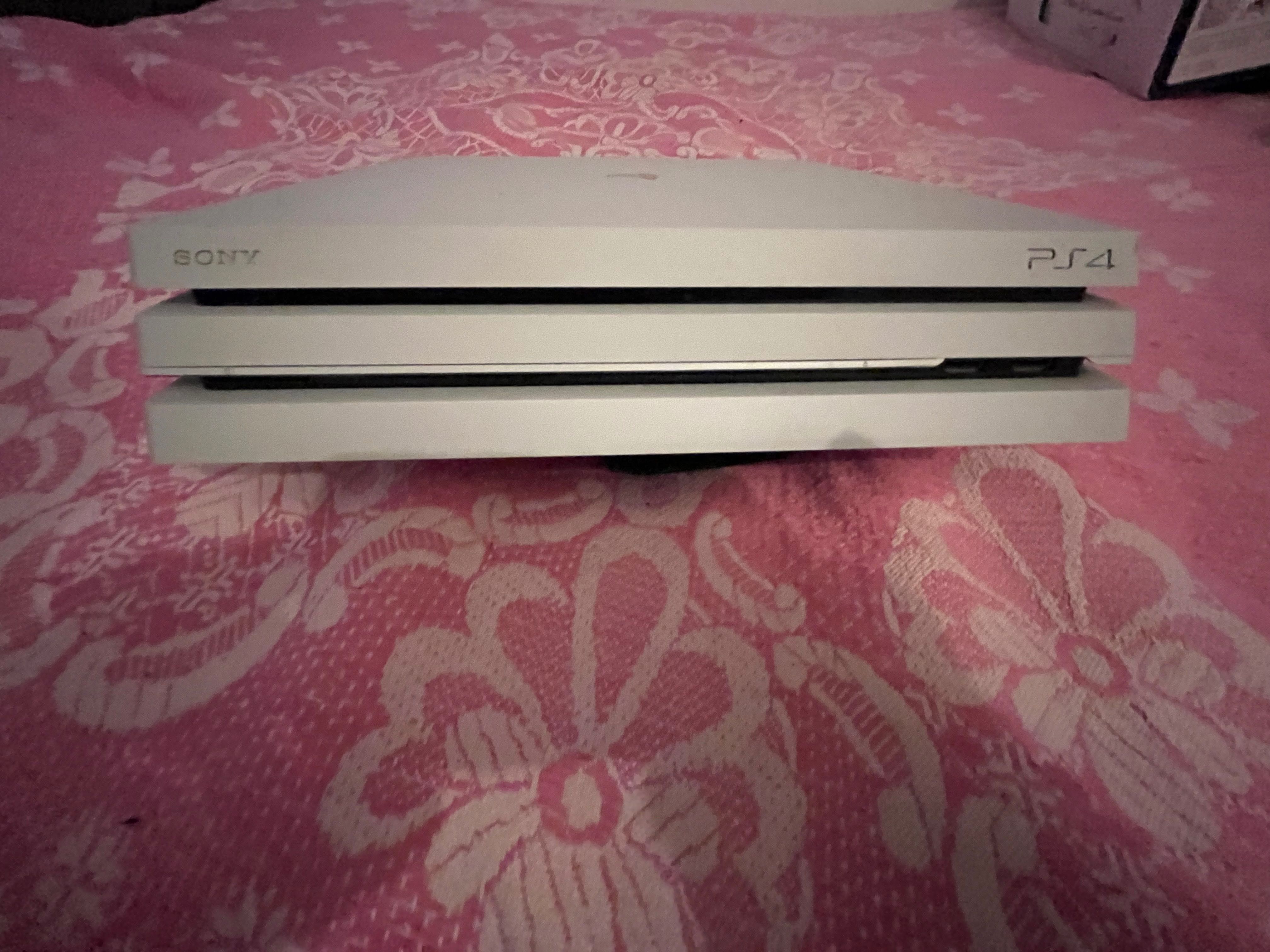 PS4 Pro 1TB 4K auscultadores e dois jogos