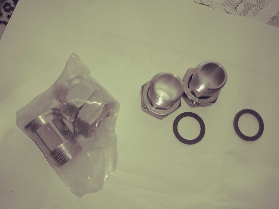 Śrubunki mosiężne  do wodomierza 1" z uszczelkami NOWE 2 kpl