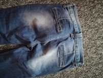Jeansy z przetarciami XS