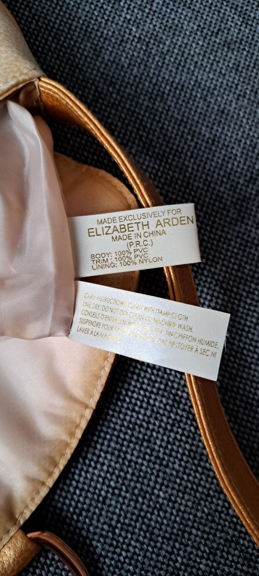 Złota  torebka Elizabeth Arden