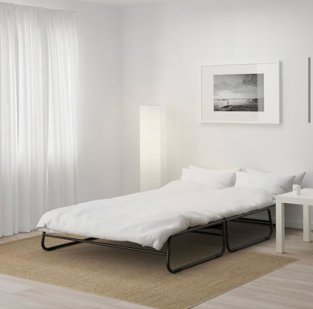 Sofá cama cinzento
