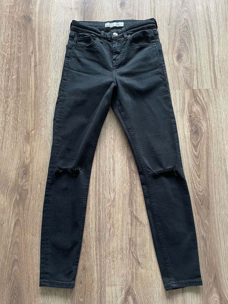 Spodnie jeansy skinny czarne z dziurami Topshop